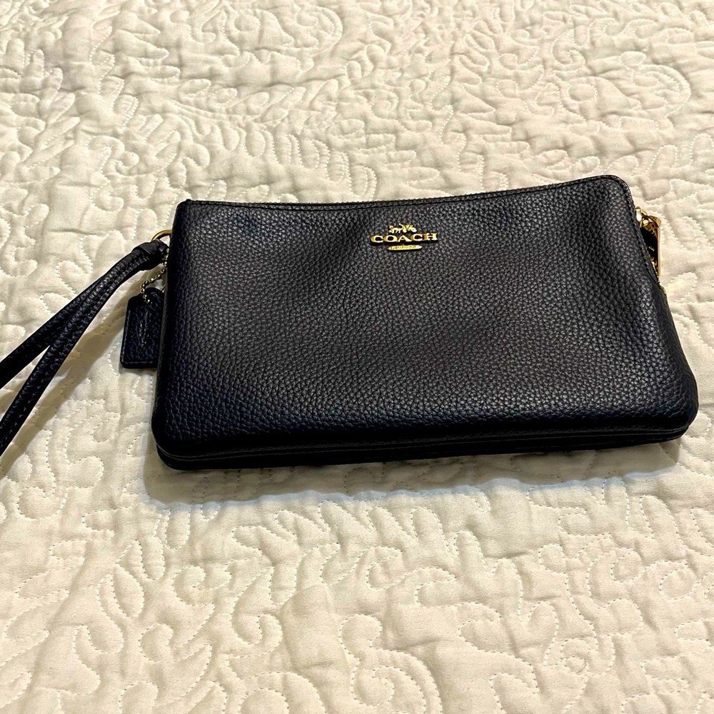 Coach double sided navy leather wristlet with card pockets on each side